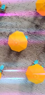 Aerial view of yellow beach umbrellas on sandy beach.