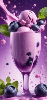 Purple berry smoothie with blueberries and mint leaves.