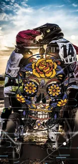 Biker duo on motorcycles with a floral skull design, set against a sunset backdrop.