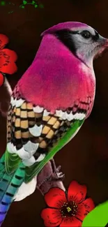 Vibrant bird with pink plumage and red flowers on a dark background.