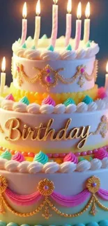 Colorful birthday cake with candles and decorative icing.