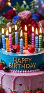 Vibrant birthday cake with colorful candles.