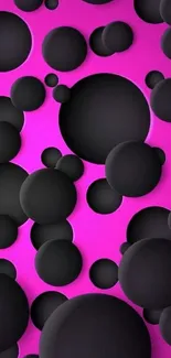 Black bubbles on vibrant pink background wallpaper.