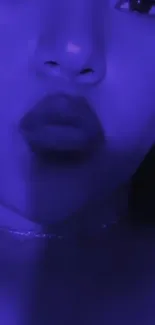 Close-up of a face with a deep blue aesthetic and mysterious vibe.