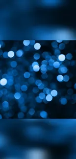 Vibrant blue bokeh effect wallpaper with abstract design.