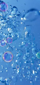 Vibrant blue bubbles with colorful reflections against a sky blue background.