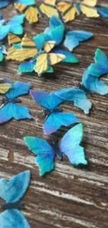 Blue butterflies scattered on a brown wooden surface.