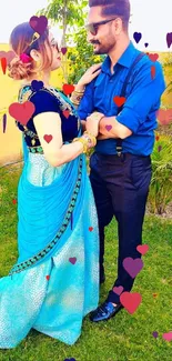 A couple in vibrant blue attire enjoying an outdoor setting.