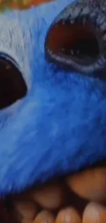 Close-up view of a vibrant blue creature with detailed texture.