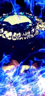 Blue gemstone ring amidst vivid flames wallpaper.