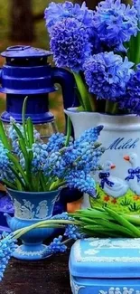 Bright blue flowers in ceramic pots on a rustic background