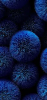 Vibrant blue furry circles abstract texture.