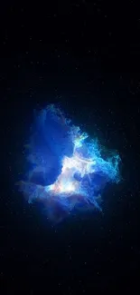 Blue galaxy wallpaper with cosmic nebula glowing in night sky.