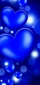 Vibrant blue hearts wallpaper with glowing effects.