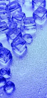 Vibrant blue ice cubes with droplets on a surface.