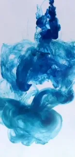 Artistic blue ink splash on white background.