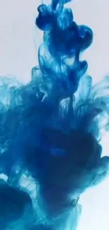 Dynamic blue ink swirl on white background.