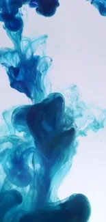 Captivating blue ink swirling in water, creating an artistic mobile wallpaper design.