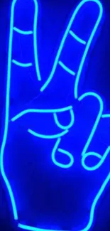 Neon blue peace sign glowing on wallpaper background.