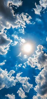 Bright sky with clouds and sun in vibrant blue wallpaper.