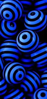 Blue and black striped spheres create a bold, dynamic phone wallpaper.