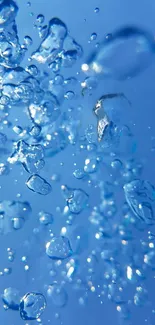 Vibrant blue water bubbles creating a refreshing mobile wallpaper background.