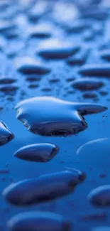 High-definition image of blue water droplets on a smooth surface.