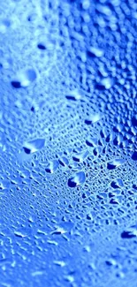 Vibrant blue droplets texture on wallpaper.