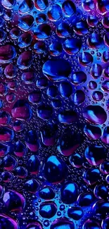 Vibrant blue and purple water droplets wallpaper.