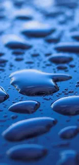 Blue water droplets wallpaper on a smooth surface.