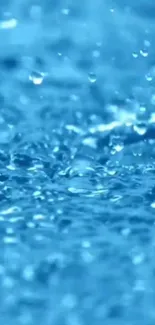 Close-up of vibrant blue water droplets.