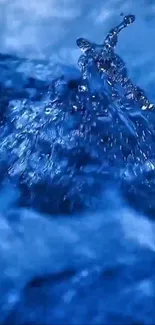 Blue water splash in dynamic motion.