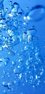 Dynamic blue water splash wallpaper for mobile.