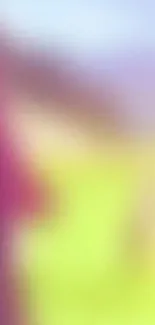 Vibrant blurred mobile wallpaper with purple, green, and yellow hues.