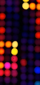 Vibrant bokeh light wallpaper with colorful dots.