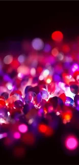 Vibrant bokeh lights in red and purple hues creating an abstract glow.