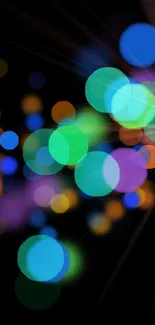 Vibrant bokeh wallpaper with colorful circles on a dark background.