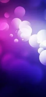 Colorful bokeh wallpaper with purple tones.