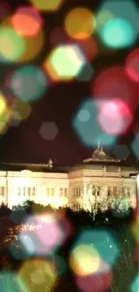 Colorful bokeh lights framing a classical building at night.