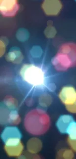 Colorful bokeh with lights and hexagon shapes on a dark background.