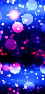 Vibrant bokeh phone wallpaper with pink and blue circles.