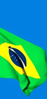 Brazil flag waving on a blue background wallpaper.