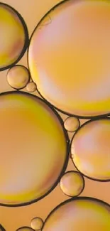 Vibrant yellow bubbles on an abstract mobile wallpaper background.