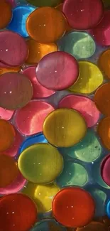 Colorful bubble art wallpaper with vibrant orbs in orange, pink, and blue hues.
