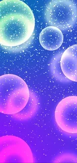 Mobile wallpaper with vibrant bubbles in a purple galaxy background.