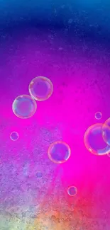 Vibrant pink gradient wallpaper with floating bubbles.