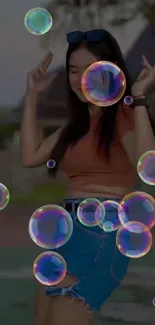 Mobile wallpaper with colorful floating bubbles.