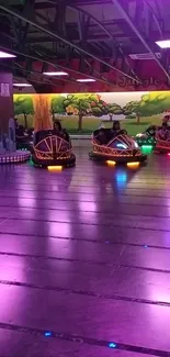 Colorful bumper cars under neon lights in an amusement park setting.