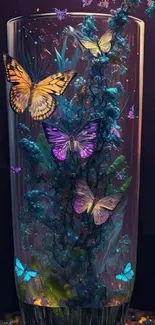 Vibrant butterfly art in a glass with colorful wings and dark purple background.