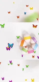 Colorful butterflies and Easter eggs on a white background.